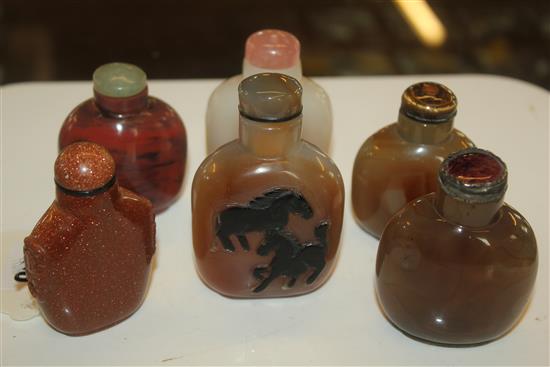 Six Chinese agate/hardstone snuff bottles, one carved with horses, one goldstone